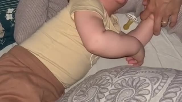 Eden, 9 months old, who apparently has funny dreams 😂