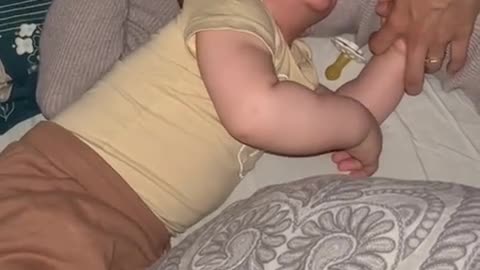 Eden, 9 months old, who apparently has funny dreams 😂