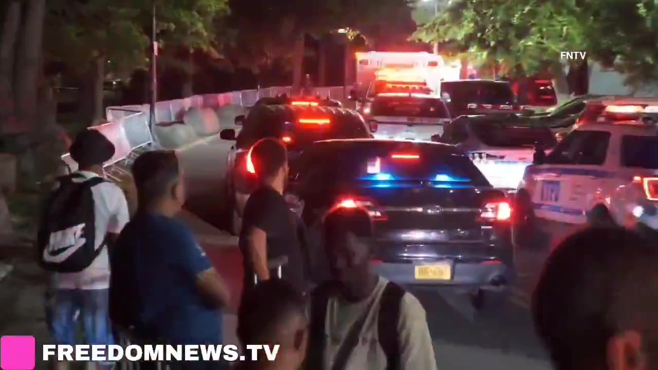 Randall's Island Park reportedly large and uncontrolled crowd at the migrant shelter.