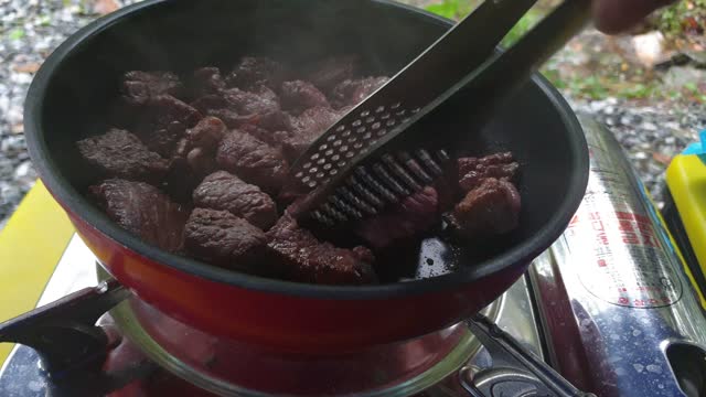 Camping and BBQ on a rainy day.