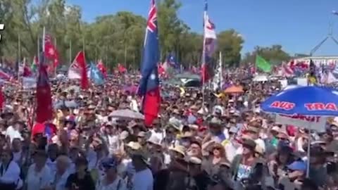 SACK THEM ALL' outside Parliament House in Canberra today.