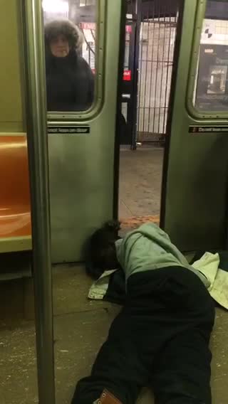 Man passed out on doors of subway