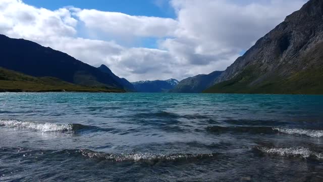 A beautiful river between the embrace of the mountains