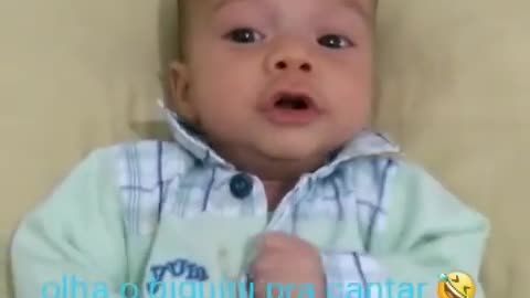 baby singing with mom