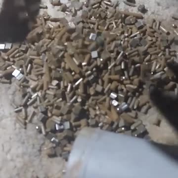 Russian soldier that downed an Ukrainian drone examine the projectile Ukrainian drone operators used