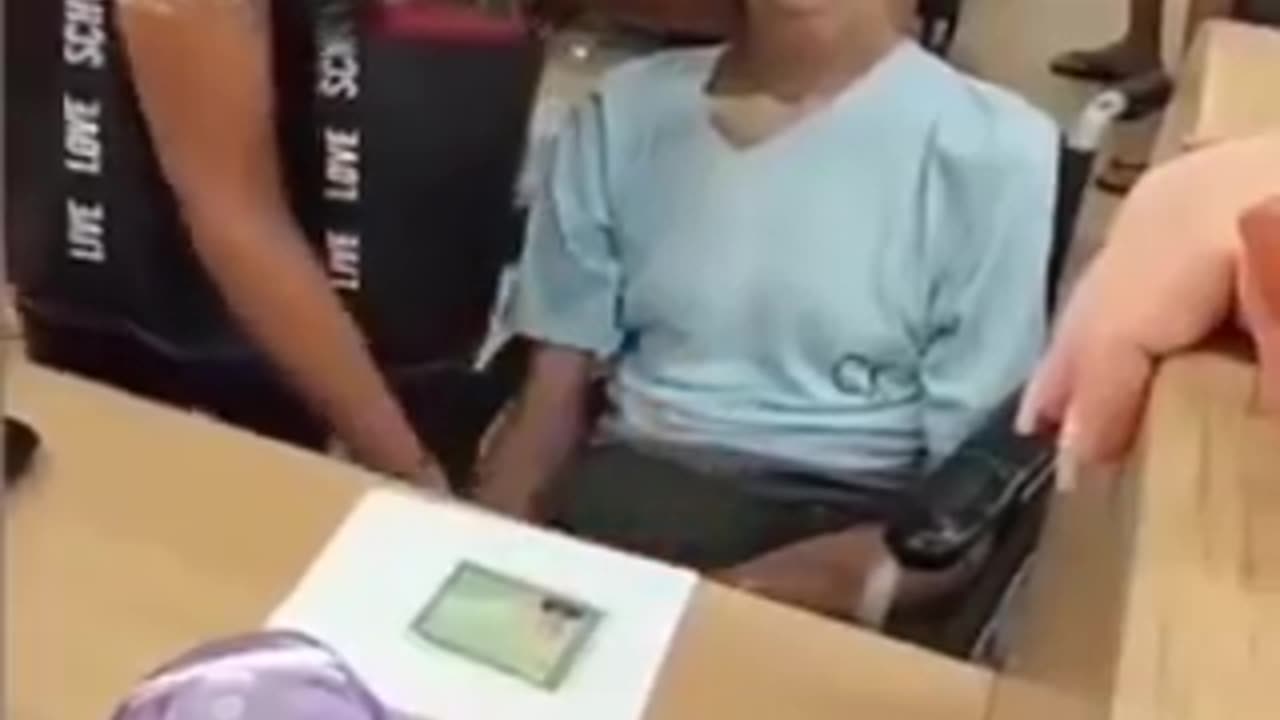 Woman accompanied a deceased man to bank in wheelchair to request a loan