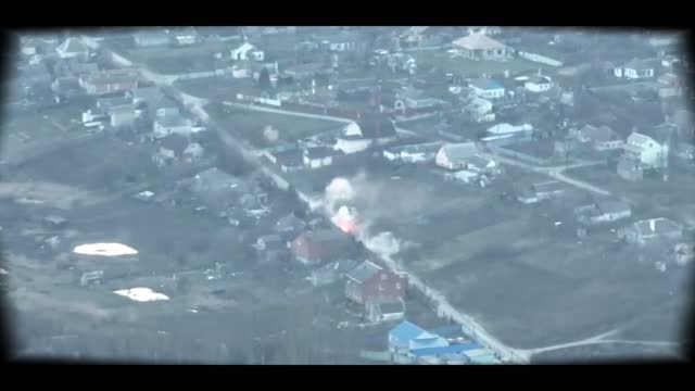 Ukrainian BTR-4 fires its 30mm cannon at Russian armored vehicles.