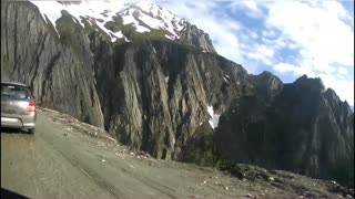 Riding Up a Steep Mountain Road