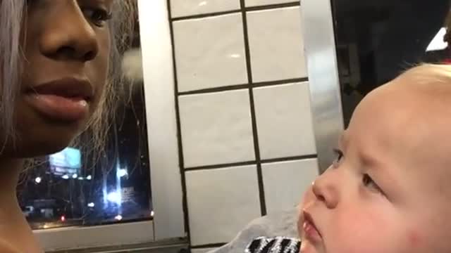 Baby Stares At Woman Then Smirks