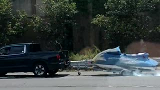 Truck Drags Jet Ski Down Expressway