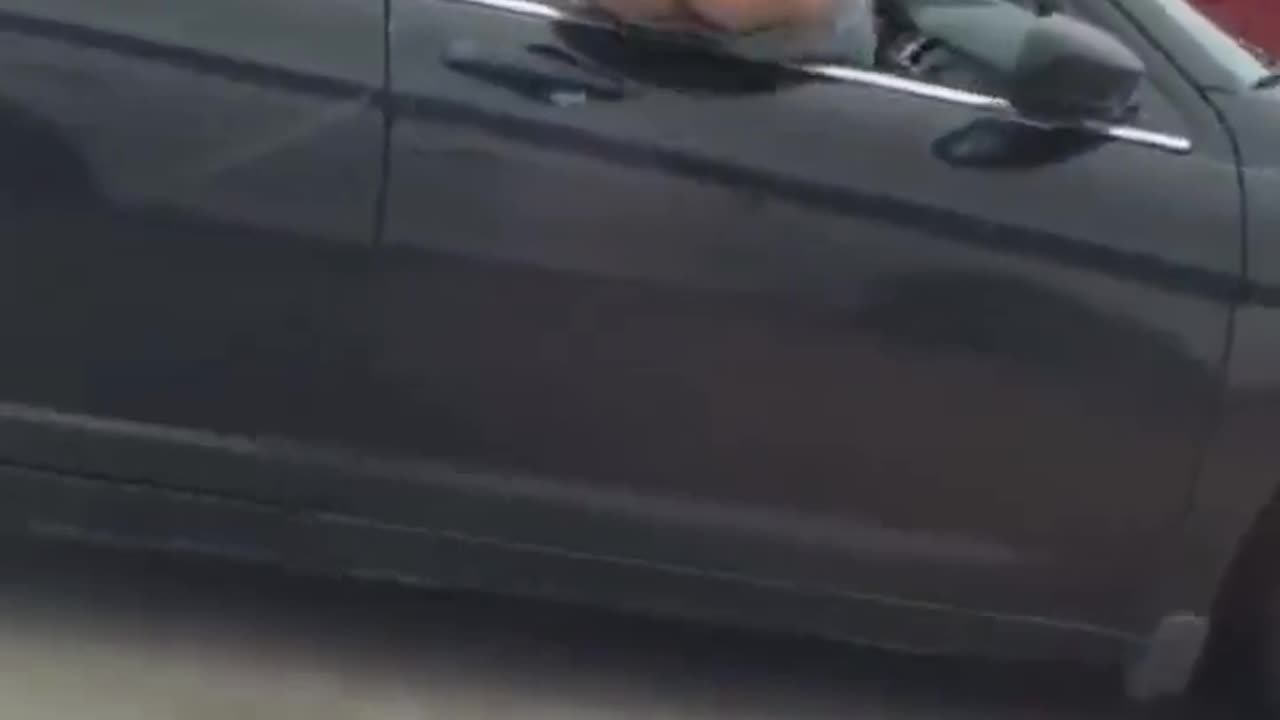 dude falls out of car at high speed doing prank.