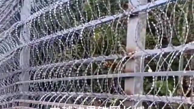 Covid Proof Razor wire fences up in China. 4000kms