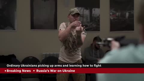 Ordinary Ukrainians learn to use rifles to join the fight against Russia