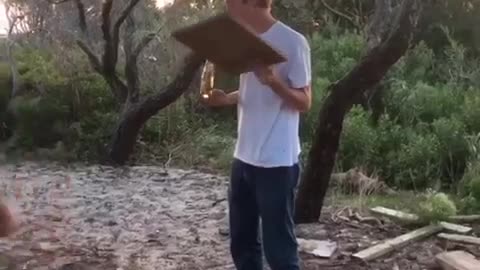 Nsfw guy throws rock and hits beer out of friends hand