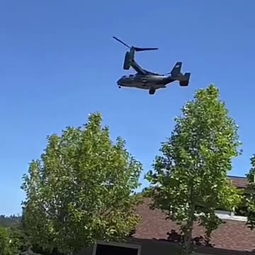 Military landing in a suburb of Larksper, California.