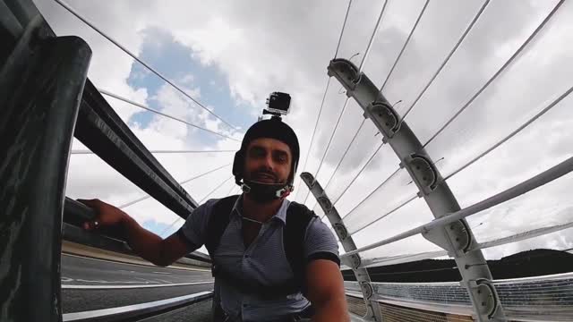 Guy Nails Base Jump On Rainy Suspension Bridge