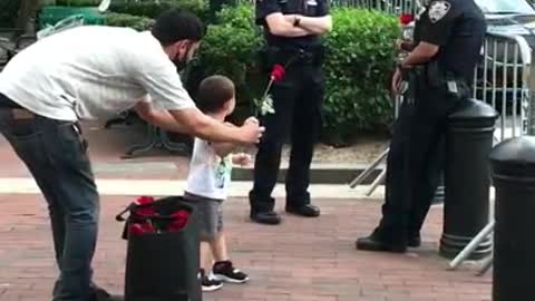 Little boy showing love to the NYPD.