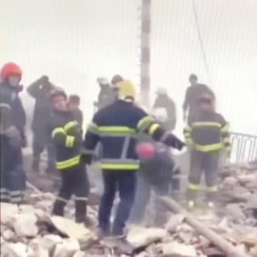 Ukrainian rescue workers at havryshivka vinnytsia international airport