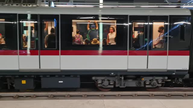 Subway cars departing from an underground station