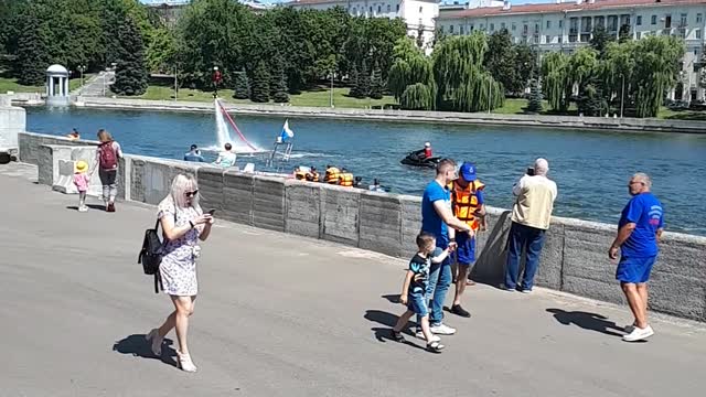 a person flies over water