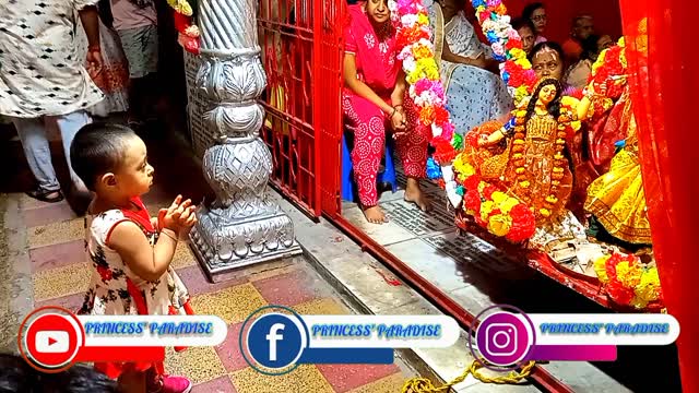 Adorable kid enjoying Jhulan jatra festival