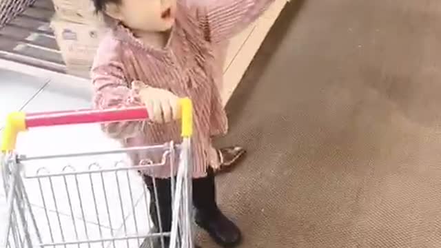 Cute baby to the supermarket