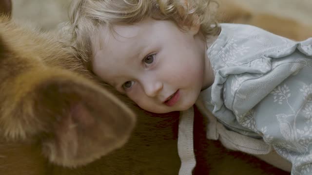 children-hugging-animals