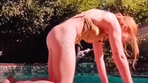 Morning yoga by the pool