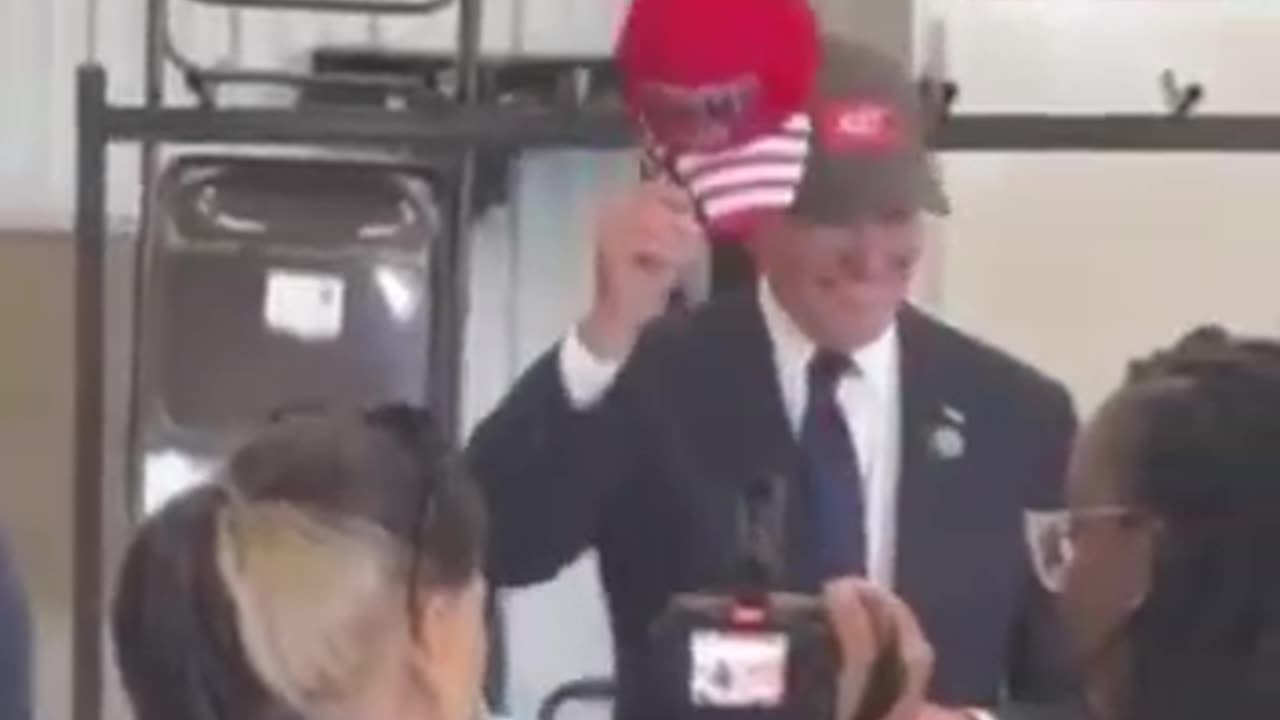 Biden Puts on a TRUMP Hat