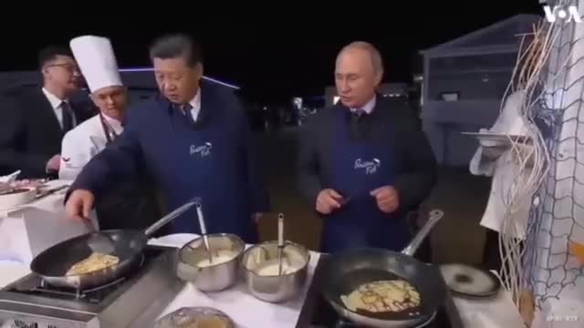 Xi and Putin make pancakes