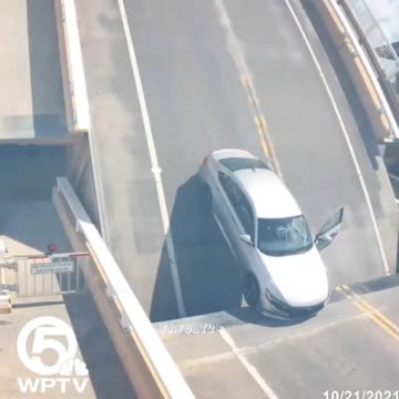 Man gets stuck on rising lift bridge