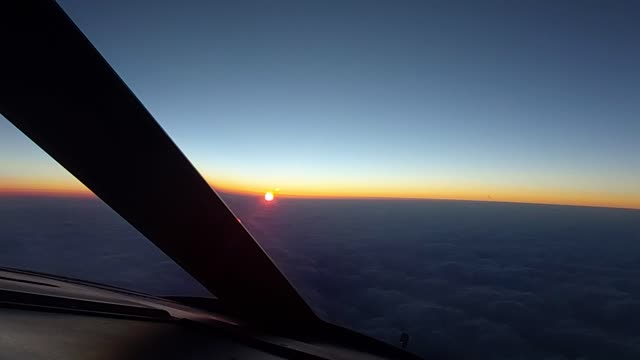 When the sun rising beyond the cloud