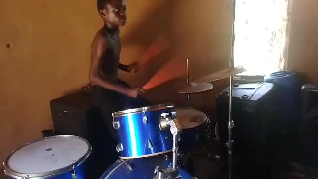 practicing how to play drums