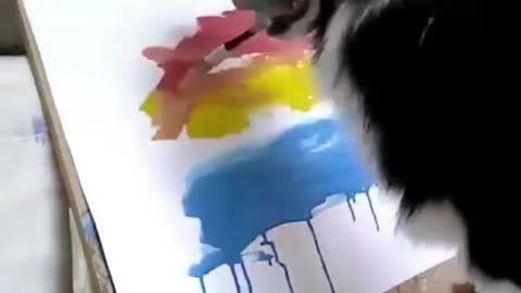 OMG this Dog can draw and paint