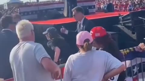 Breaking news: Trump at rally shot, this is a video footage from behind