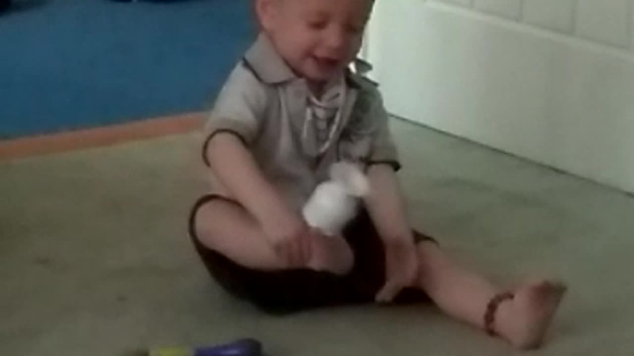 baby George laughing playing so happy