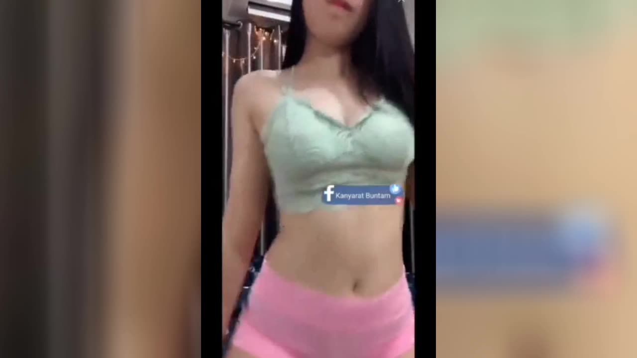 Sexy teens dance in front of the camera, Miss V's cleavage is visible