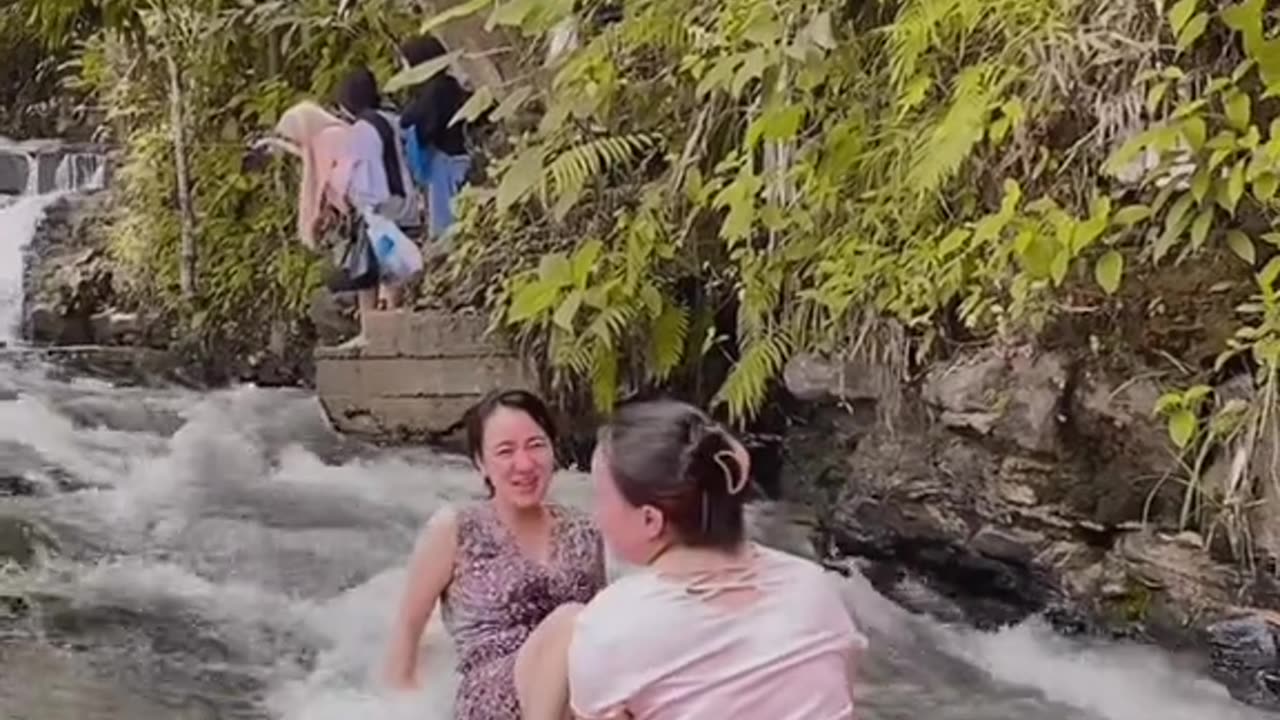 Bathing in the river - Mom Style