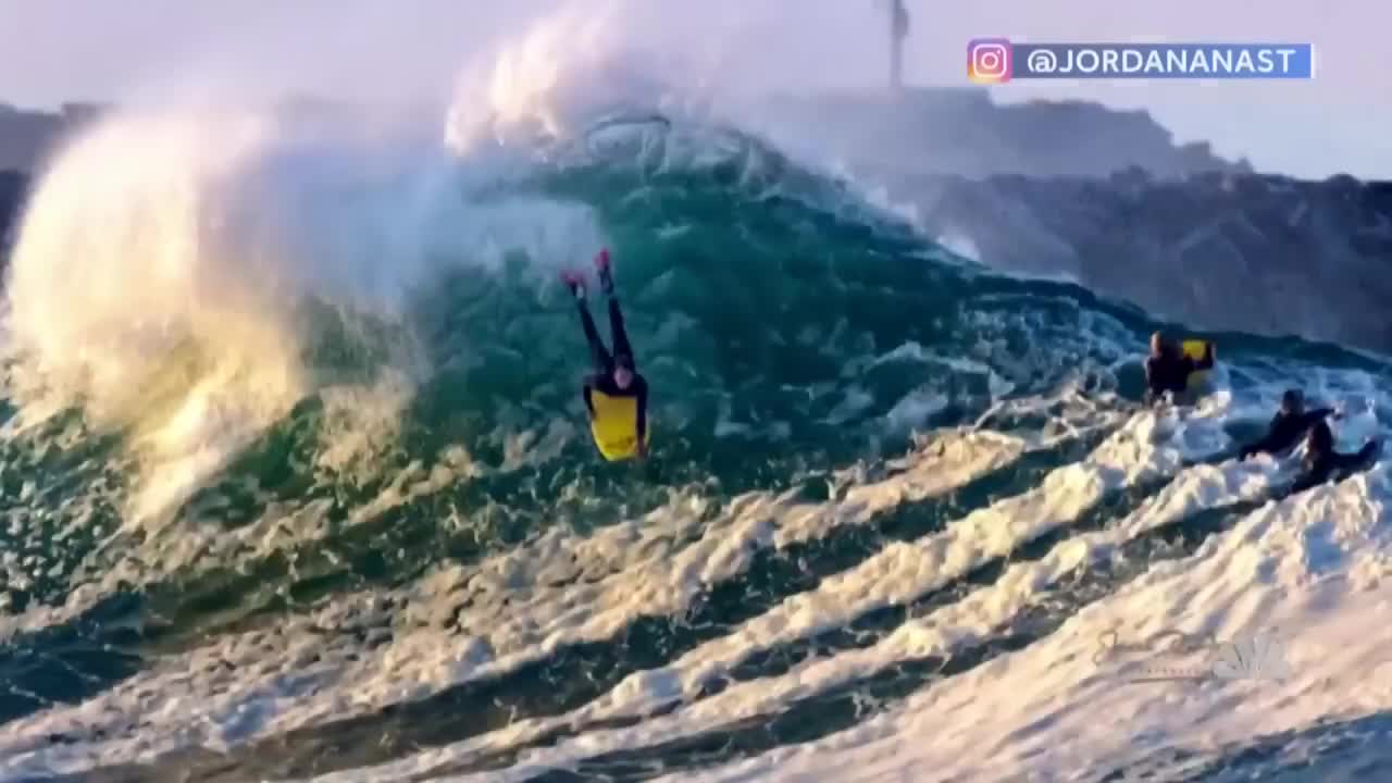 Watch: Great White Shark Leaping Out Of Water Behind Surfer