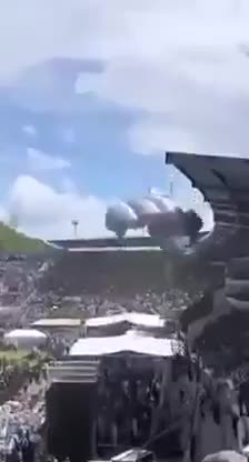 Ugandan paratroopers celebrating independence by landing in all the wrong places.