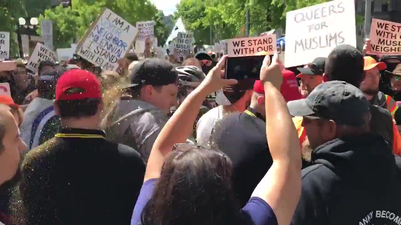 June 10 2017 Seattle 1.2 Antifa throws glitter bomb at march against Sharia protestors