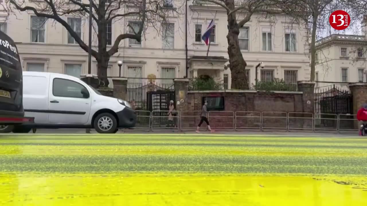 Ukraine flag painted on road outside Russian embassy in London