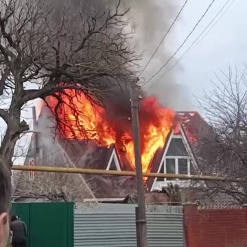 Burning house in Mariupol