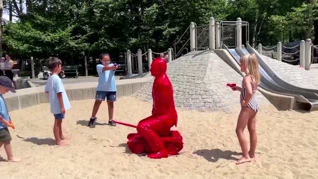 Red Putin statue pops up in Central Park