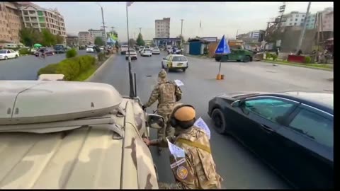 Taliban forces moving through traffic on roller skates Chinese like it