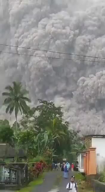 Indonesia's Mount Semeru volcano in East Java erupts sending ash 40,000ft into the sky