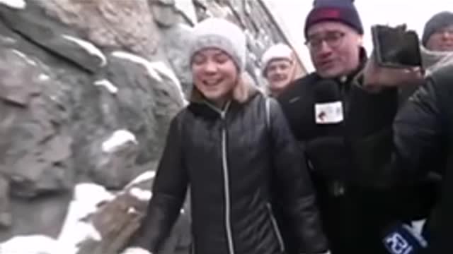 Journalists asking Greta the tough questions.