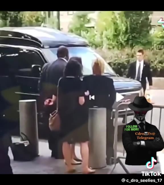Hillary in cuffs