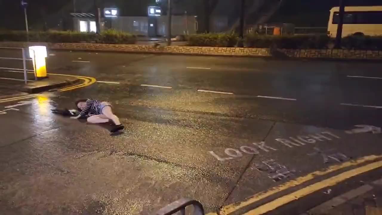 Winds from Typhoon Saola threw a woman 20 feet as the storm slams Hong Kong! 👀