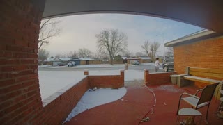 Guy Running out to Car Slips on Ice